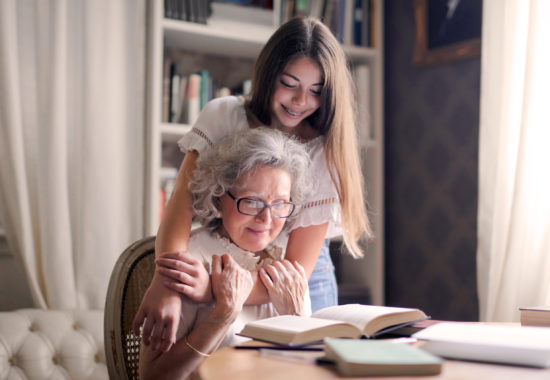 Canva - Photo of Woman Embracing Her Grandmother